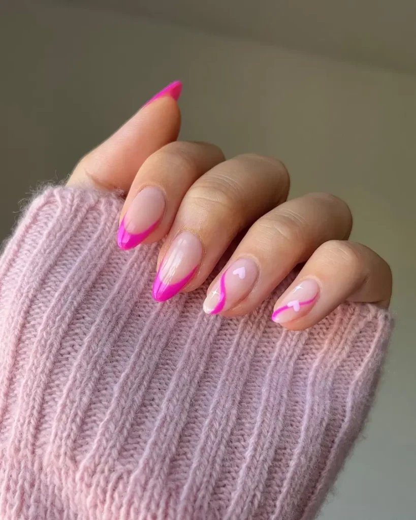 Glossy Pink French Almond Nails With Sweet Heart Details