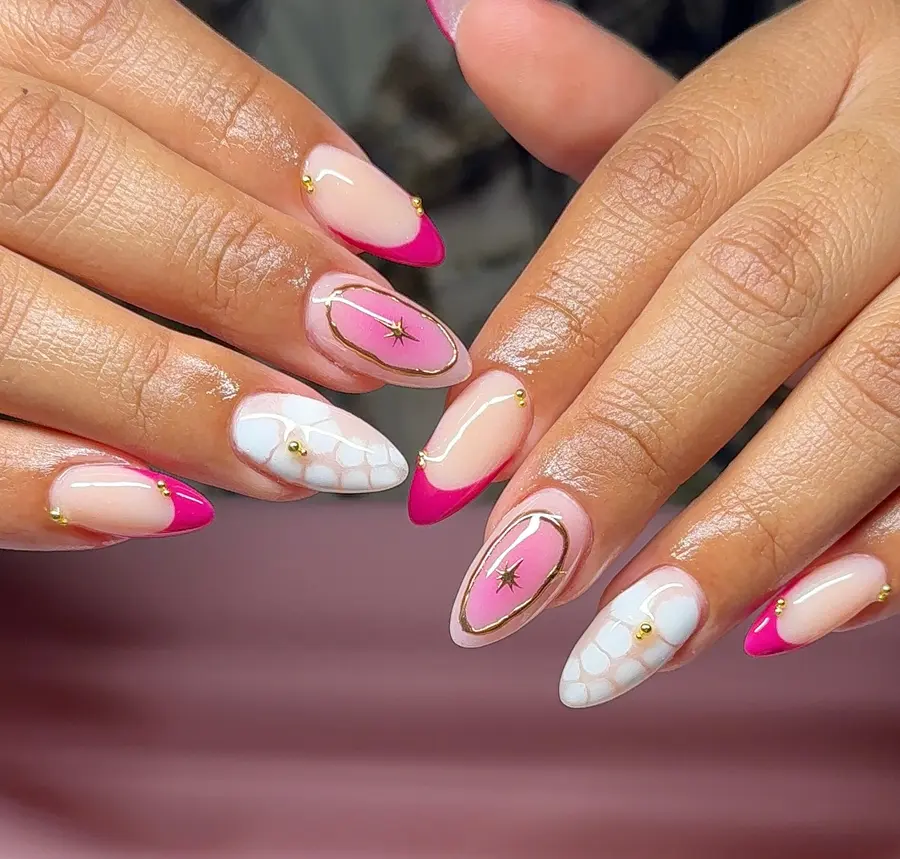 Pink Almond Nails With Bold Tips and Gold Star Details