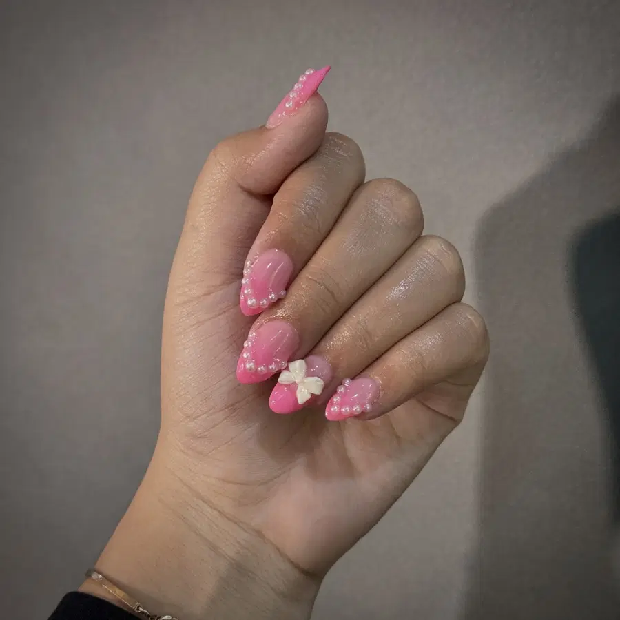 Pink Ombre Nails With Pearly Texture and a Soft 3D Accent
