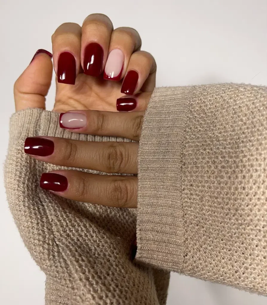 Short Red Nails With Cozy Sweater Vibes and Soft Nude Accent