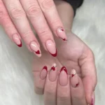 20 Stunning Ways to Wear Red French Nails for Elegant Nails Fashion image by @banstead_nails
