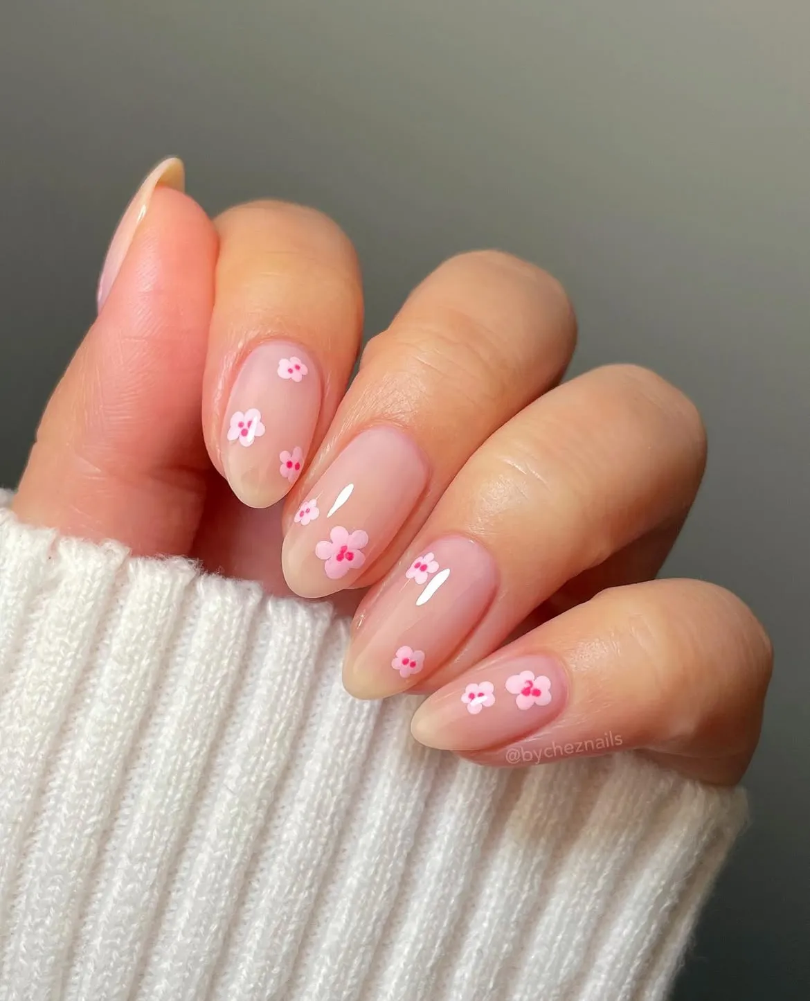 Minimal pink flowers on sheer nude base