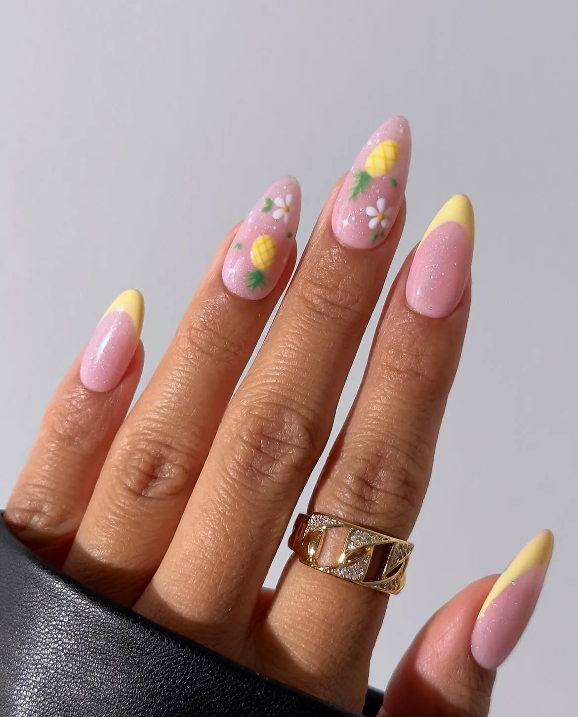 Yellow French tips with pineapples and flowers