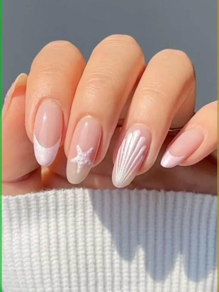 Mint-green French tips with star and flowers