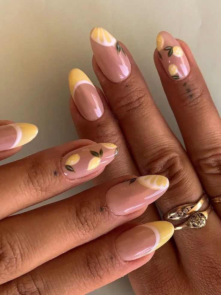 Blue ombrรฉ tips with seashell and starfish accents