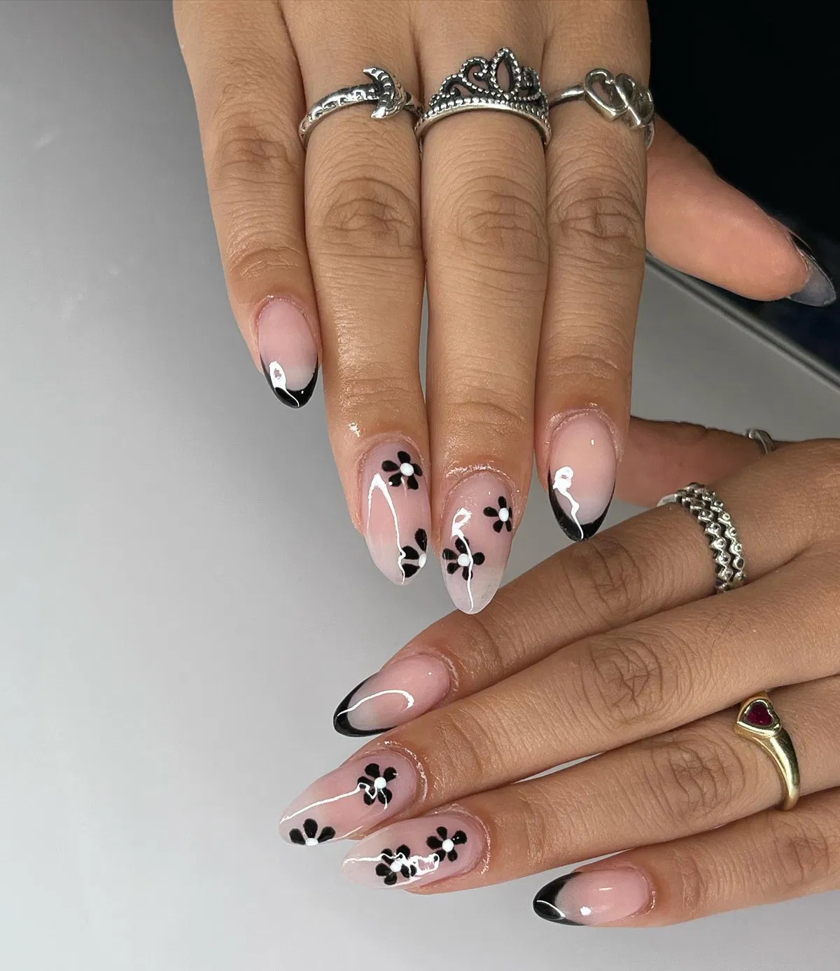 Black French tips with small black flower accents