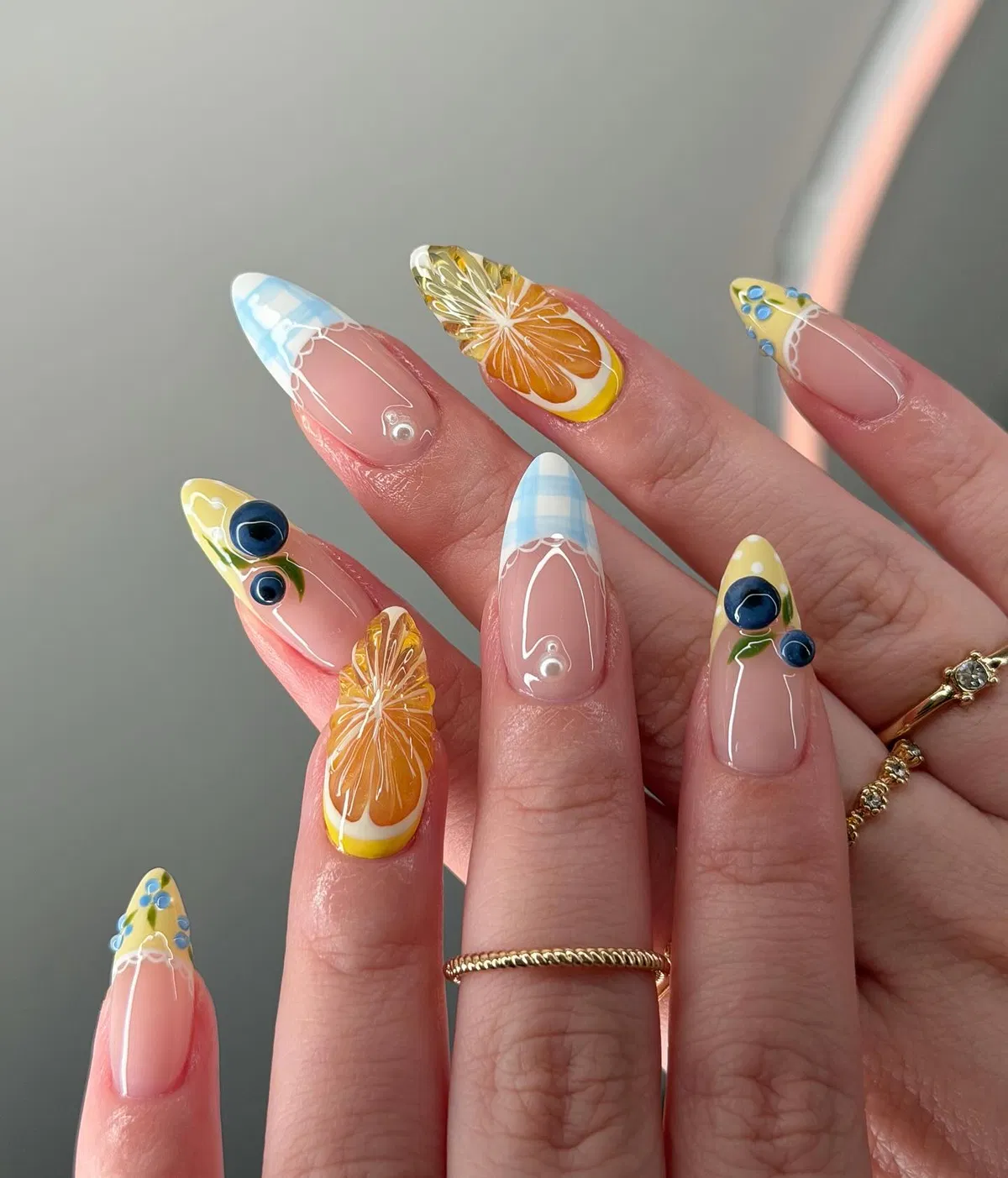 Orange citrus slices with gingham tips and blue accents