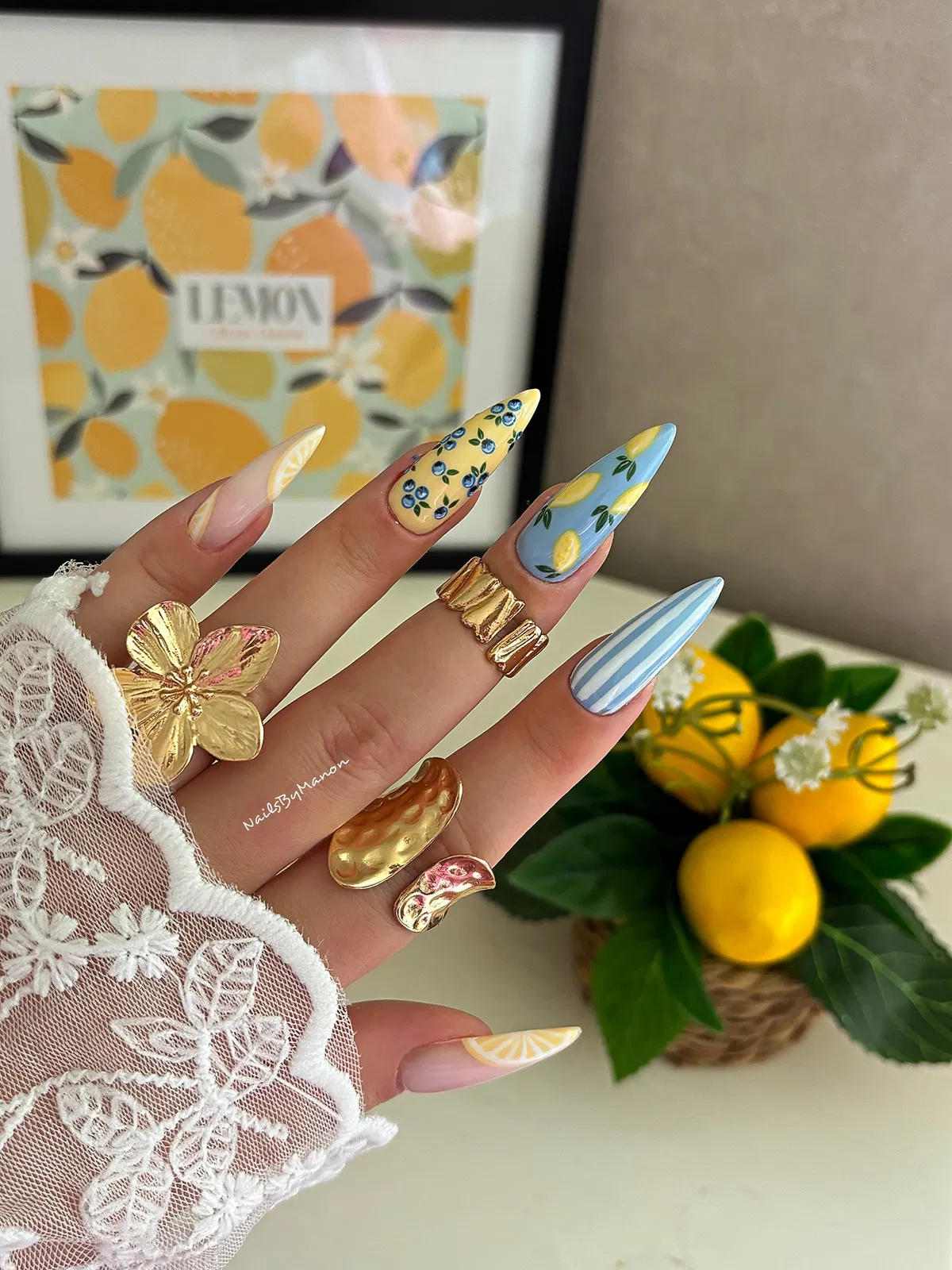 Statement stiletto set with lemon-themed background and mixed fruit motifs