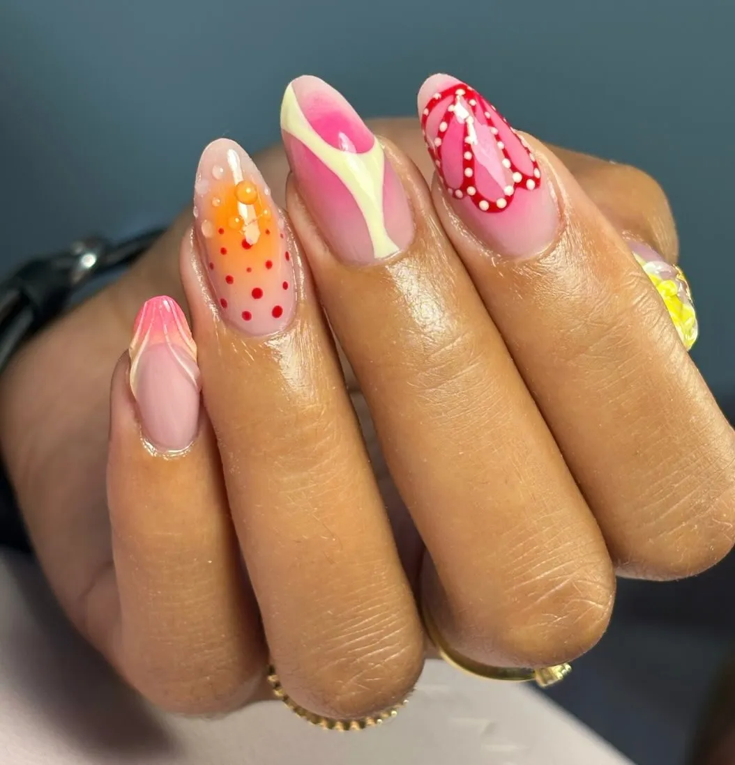 Pink waves with dotted loops and orange droplets
