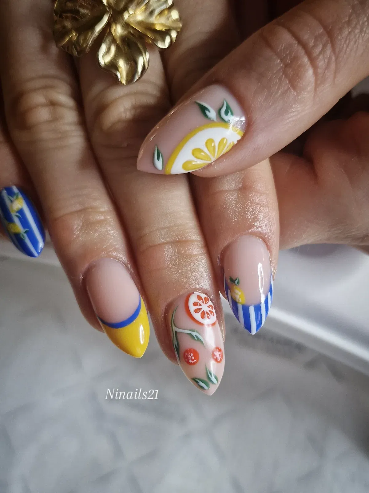 Mixed fruit motifs with bold blue/yellow accents
