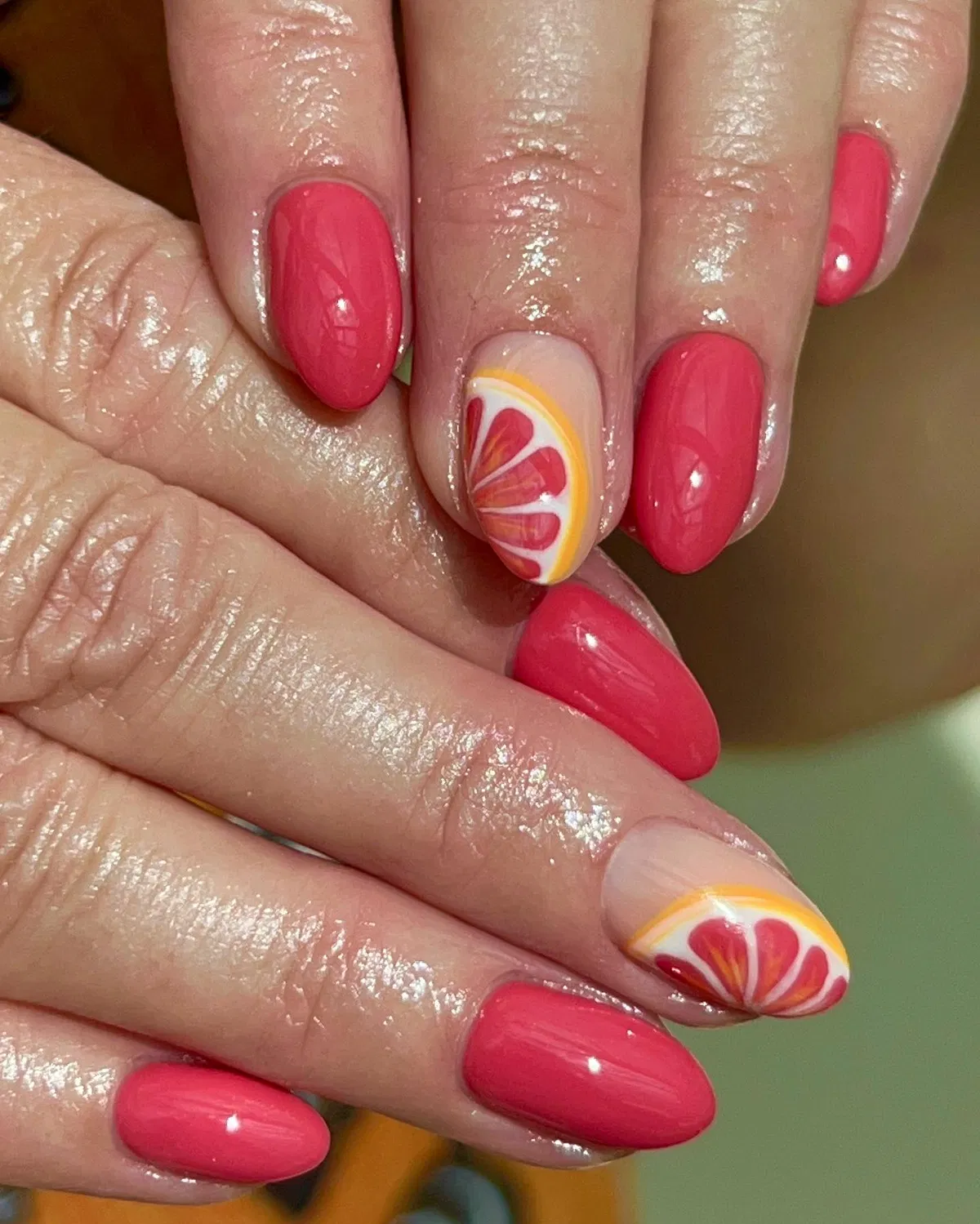 Bright pink with citrus-slice accents