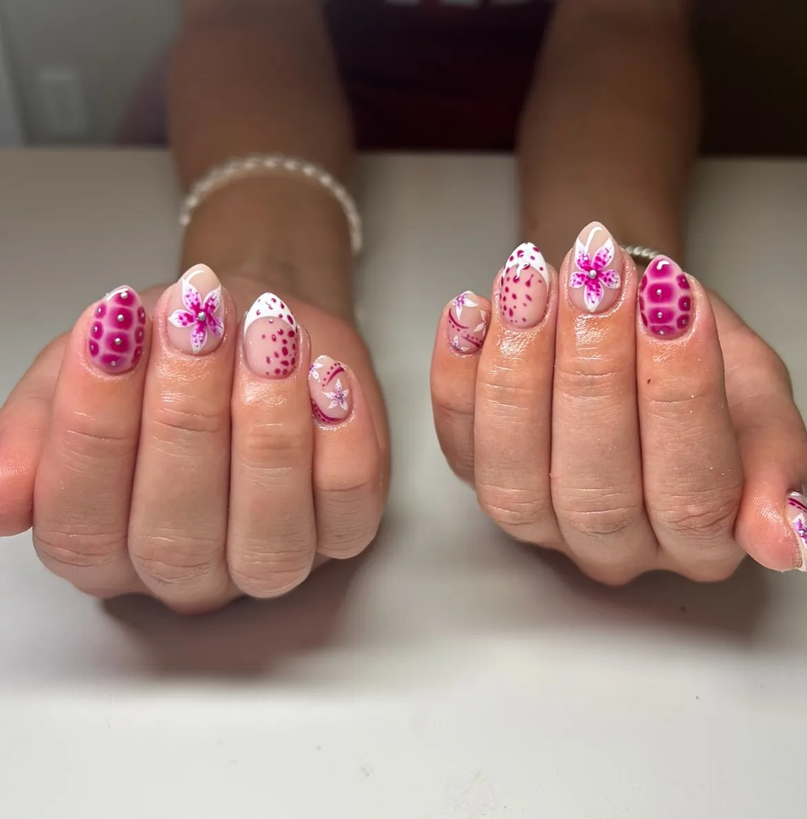 Magenta dotted accents with floral details