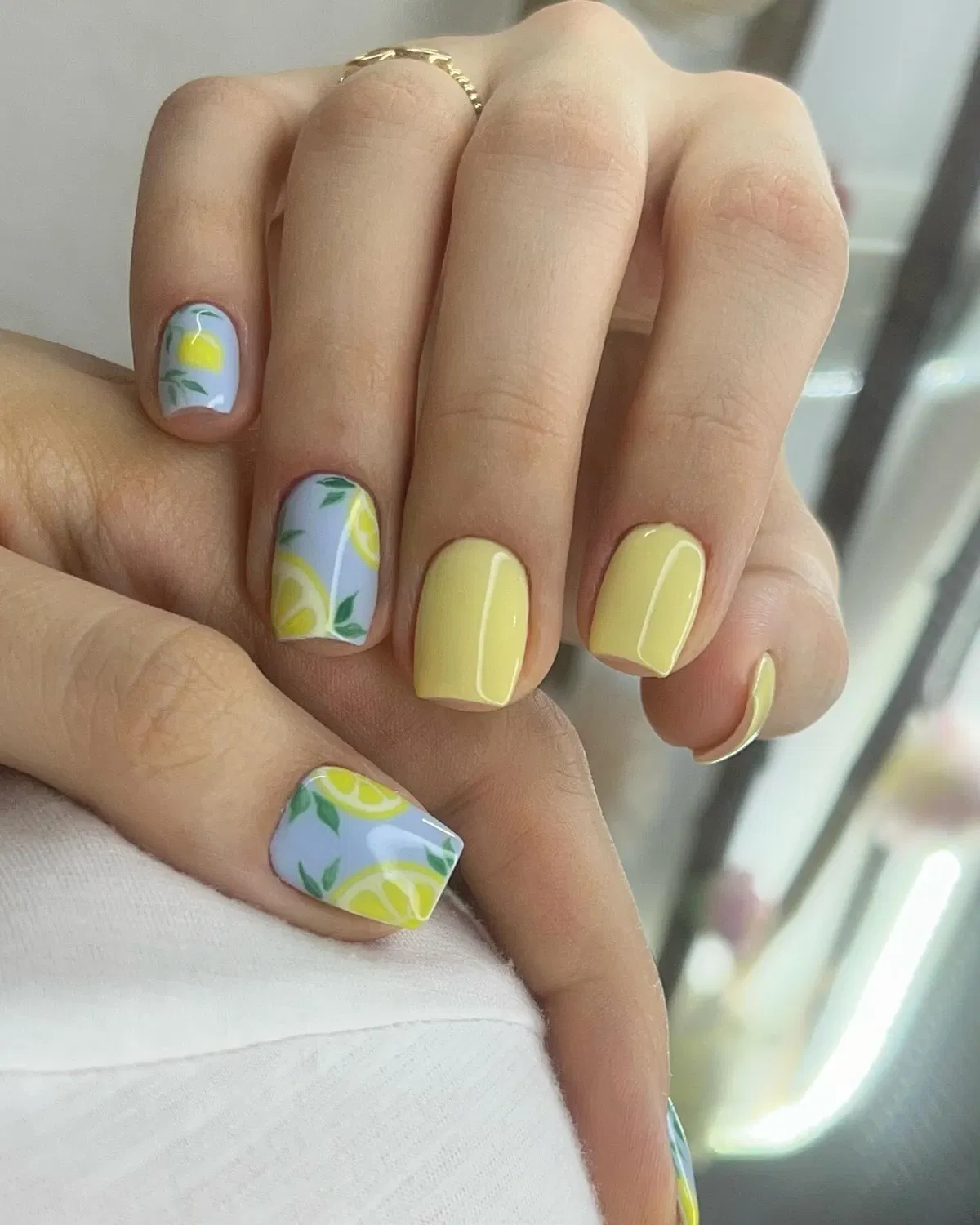 Lavender lemon-print accents with pale yellow solids