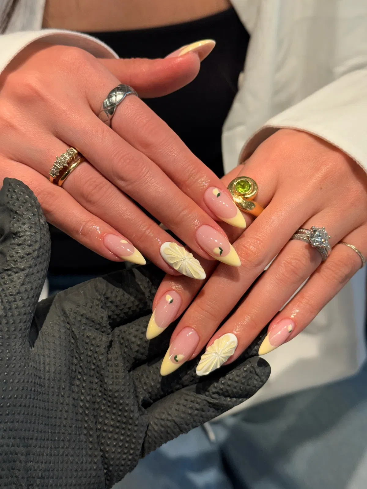 Pale yellow tips with raised citrus-slice accents