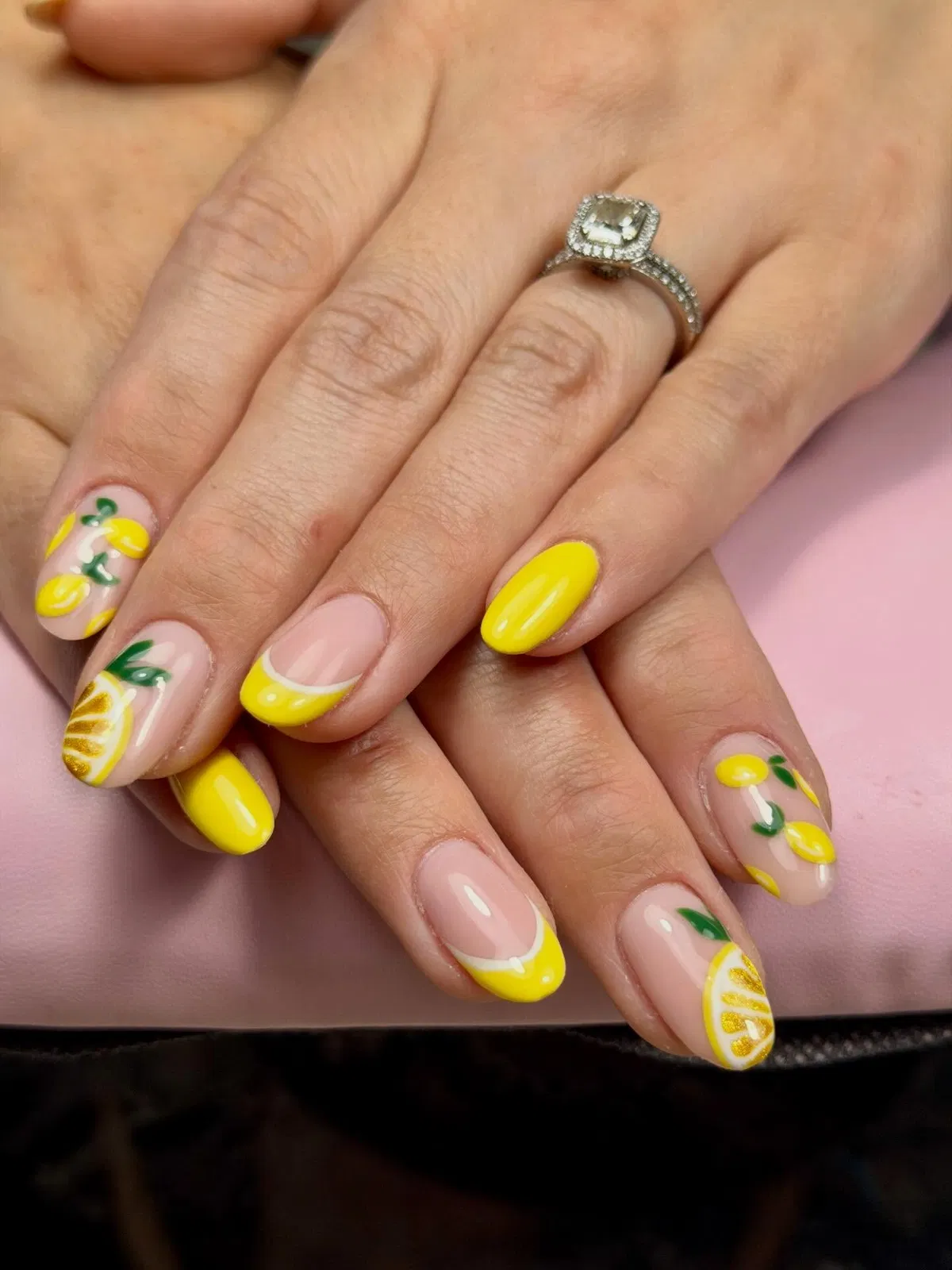 Yellow French tips with fruit-and-leaf accents