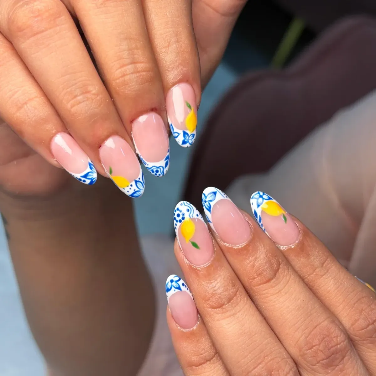 White-and-blue patterned tips with yellow fruit accents