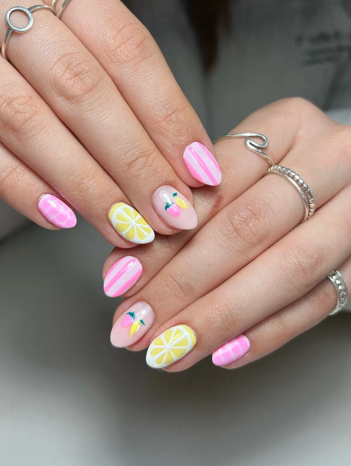 Pink stripes with citrus slices and small fruit accents