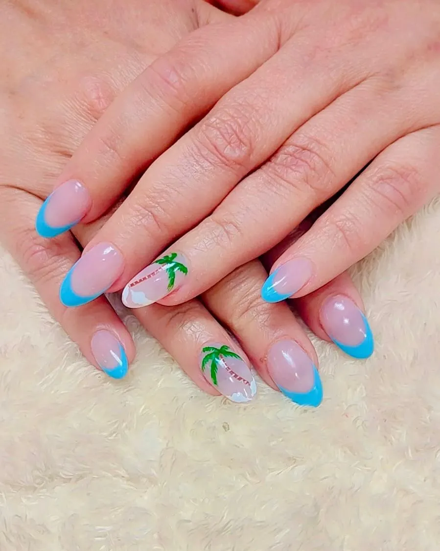 Blue French tips with palm tree accents