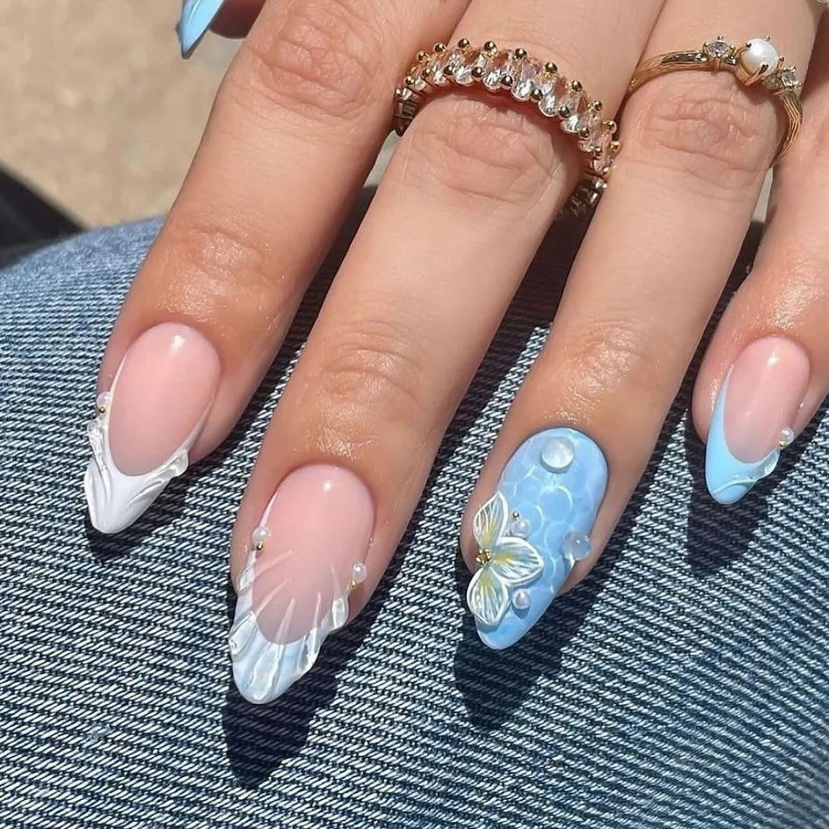 Soft blue sculpted accents with butterfly detail