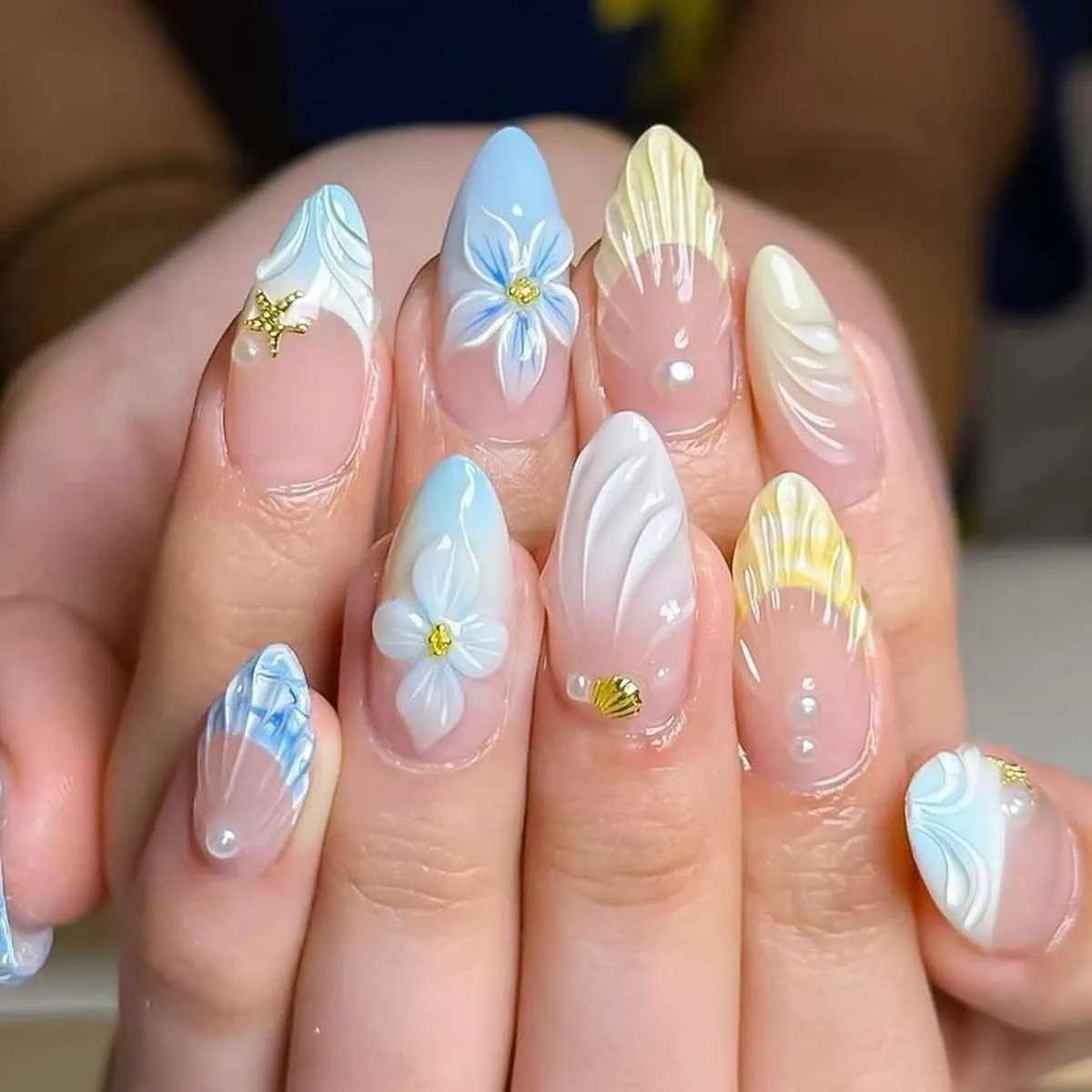 Pastel sculpted nails with 3D flowers and gold charms