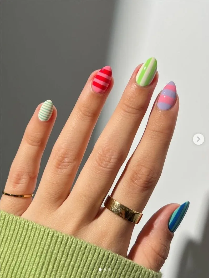Colorful striped nails in mixed directions
