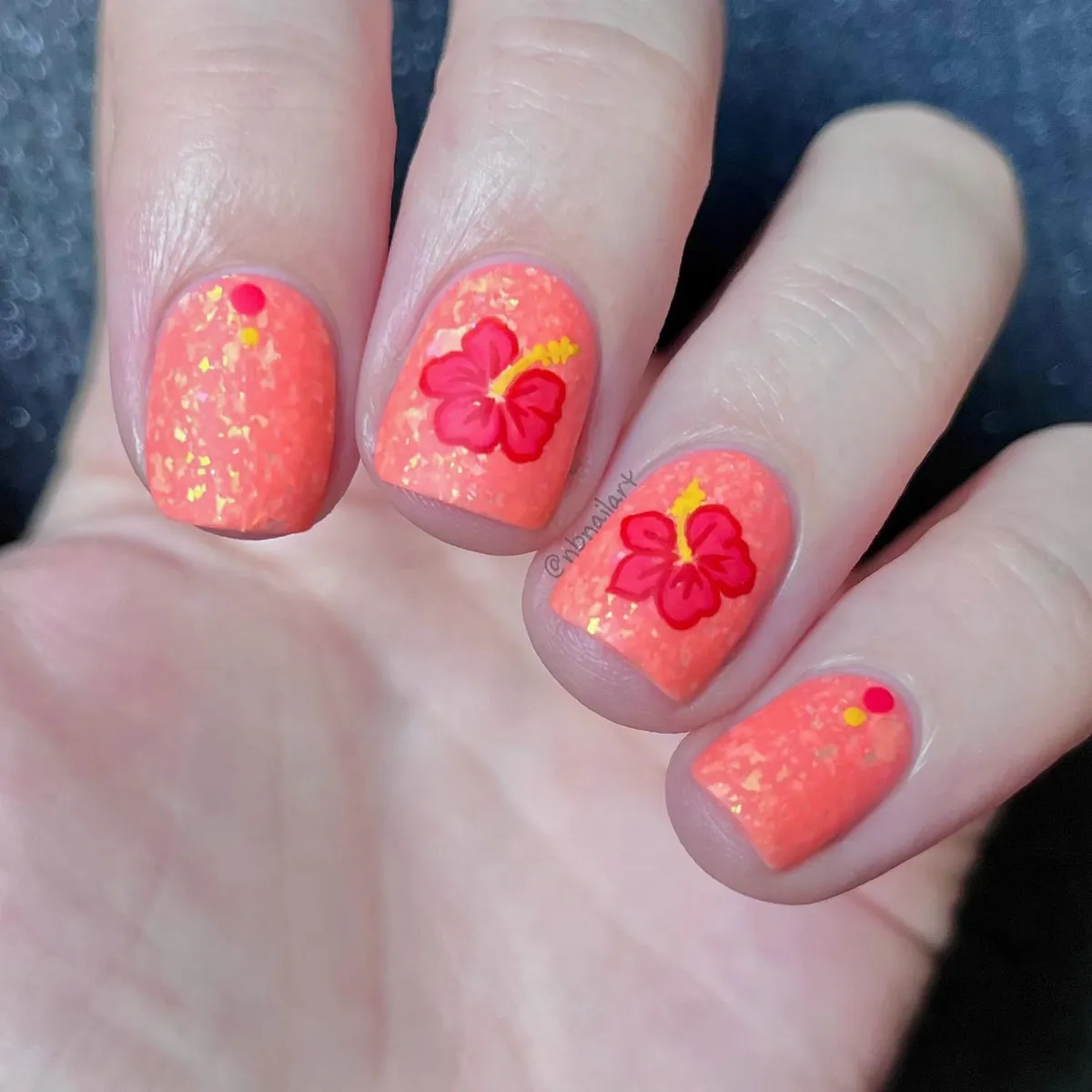Coral glitter-fleck base with red flowers