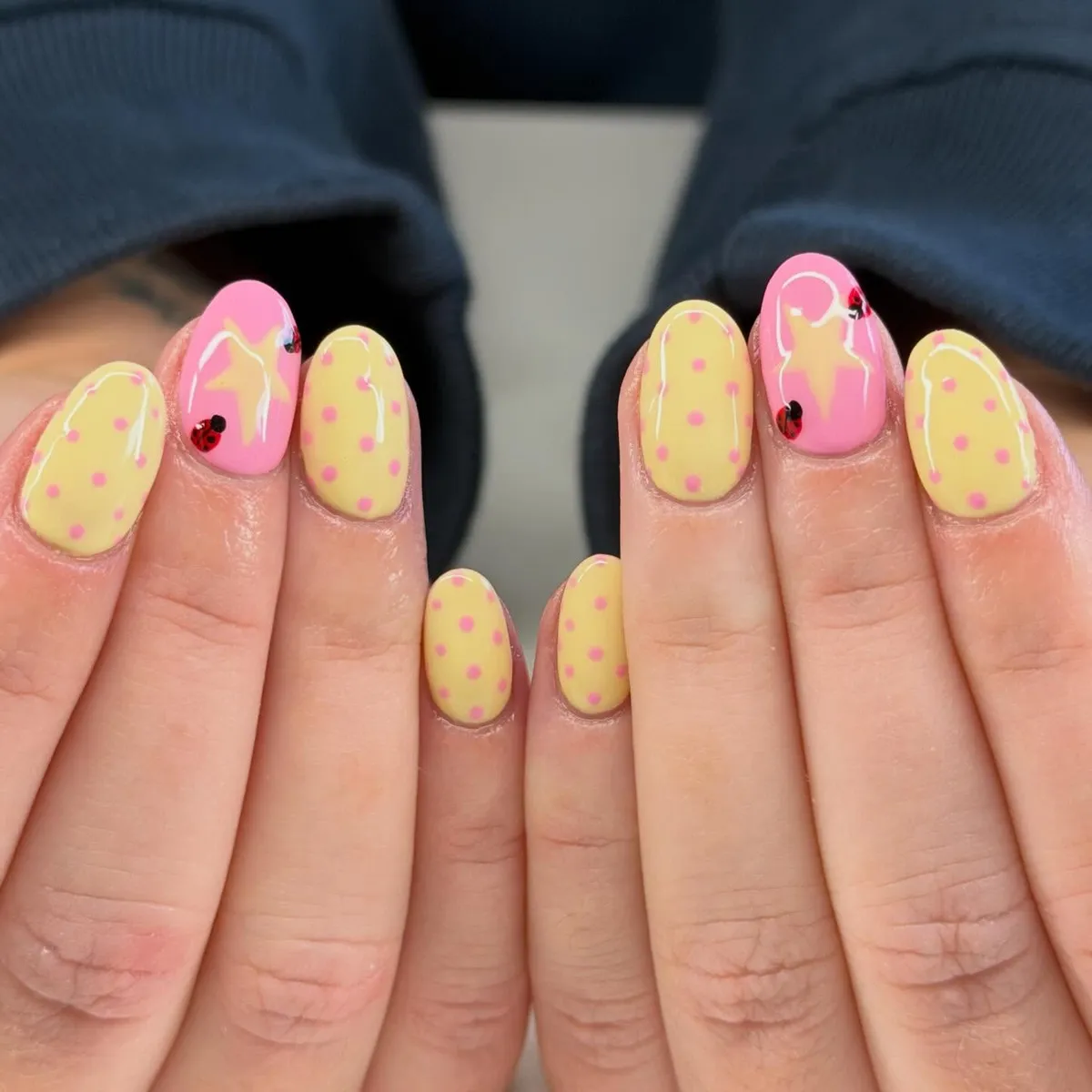 Yellow polka dots with star and ladybug accents
