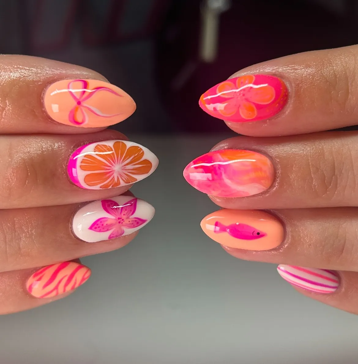 Hot pink + citrus mix with florals, stripes, and a fish detail