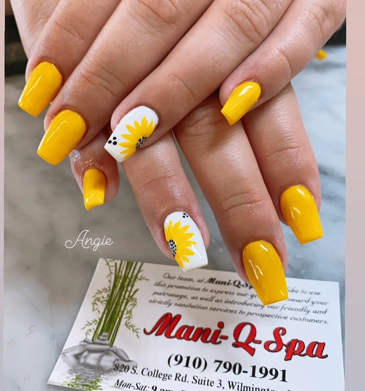Mustard-yellow solids with bold sunflower accent nails on white