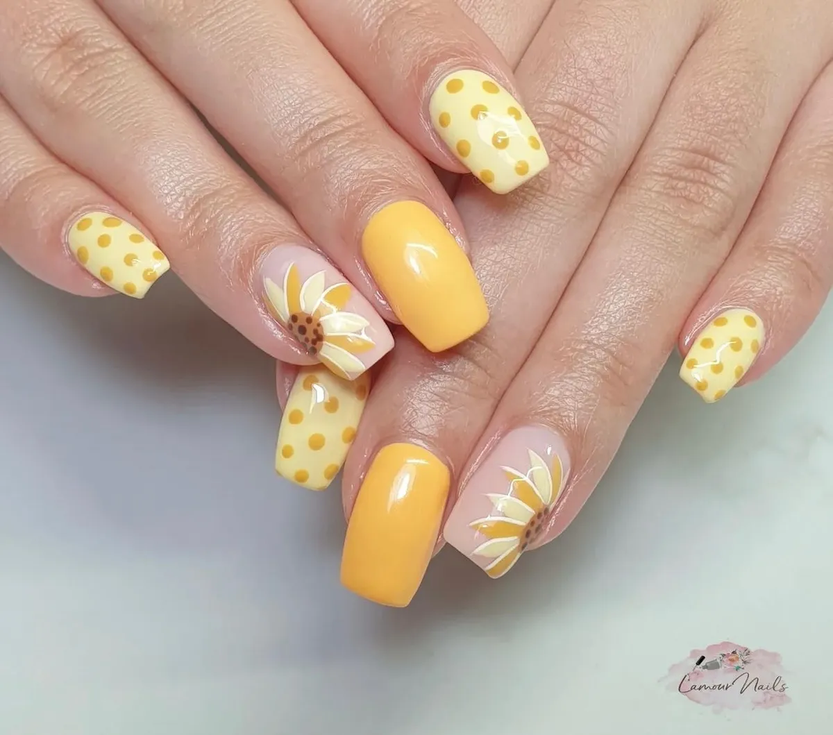 Yellow solids, yellow polka dots, and nude floral accents