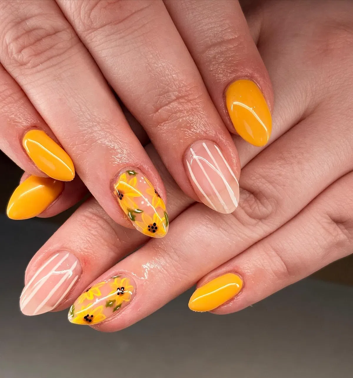 Glossy yellow with striped nude accents and yellow florals