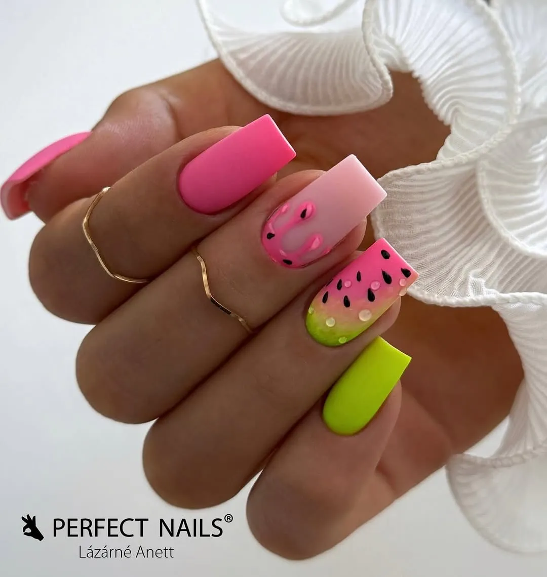 Matte pink and neon green with seed-and-droplet accent nail