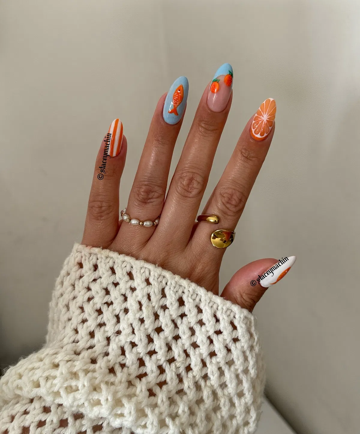 Orange Motifs on Light Blue and White Bases