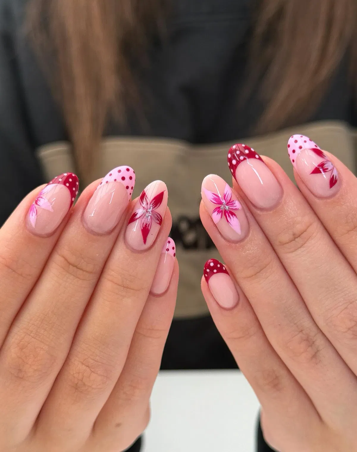 Polka-dot French tips with rhinestone florals