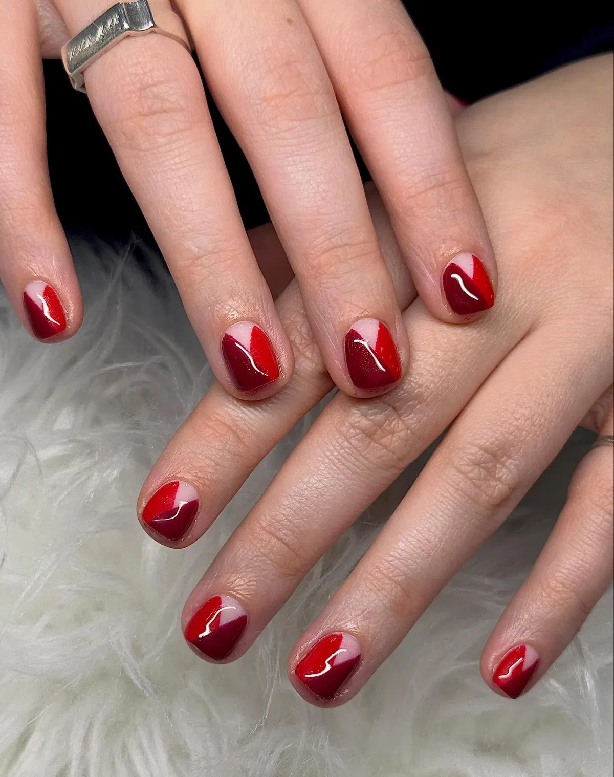 Diagonal burgundy-and-red two-tone nails