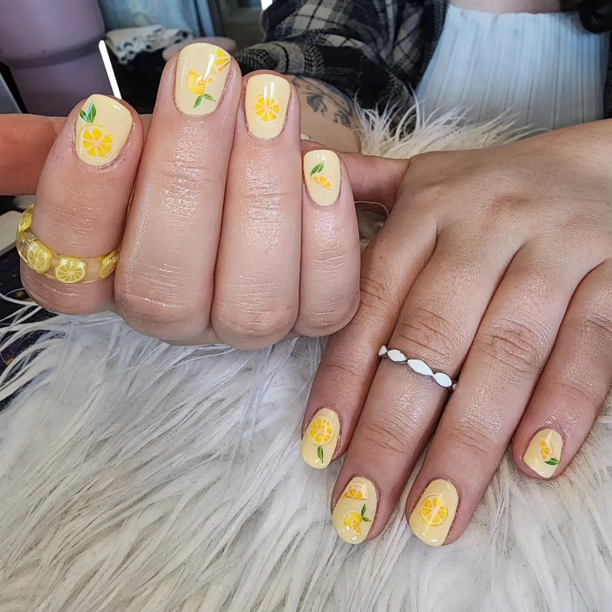 Pale yellow base with tiny lemon illustrations