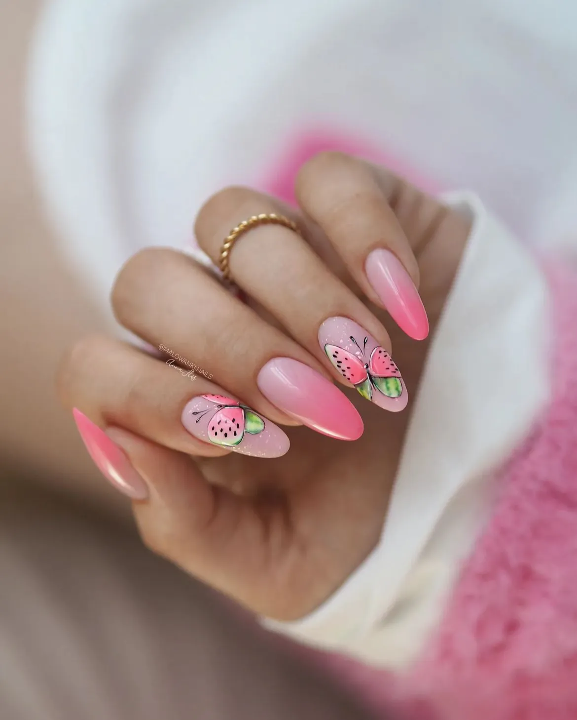 Pink ombré with butterfly accent nails