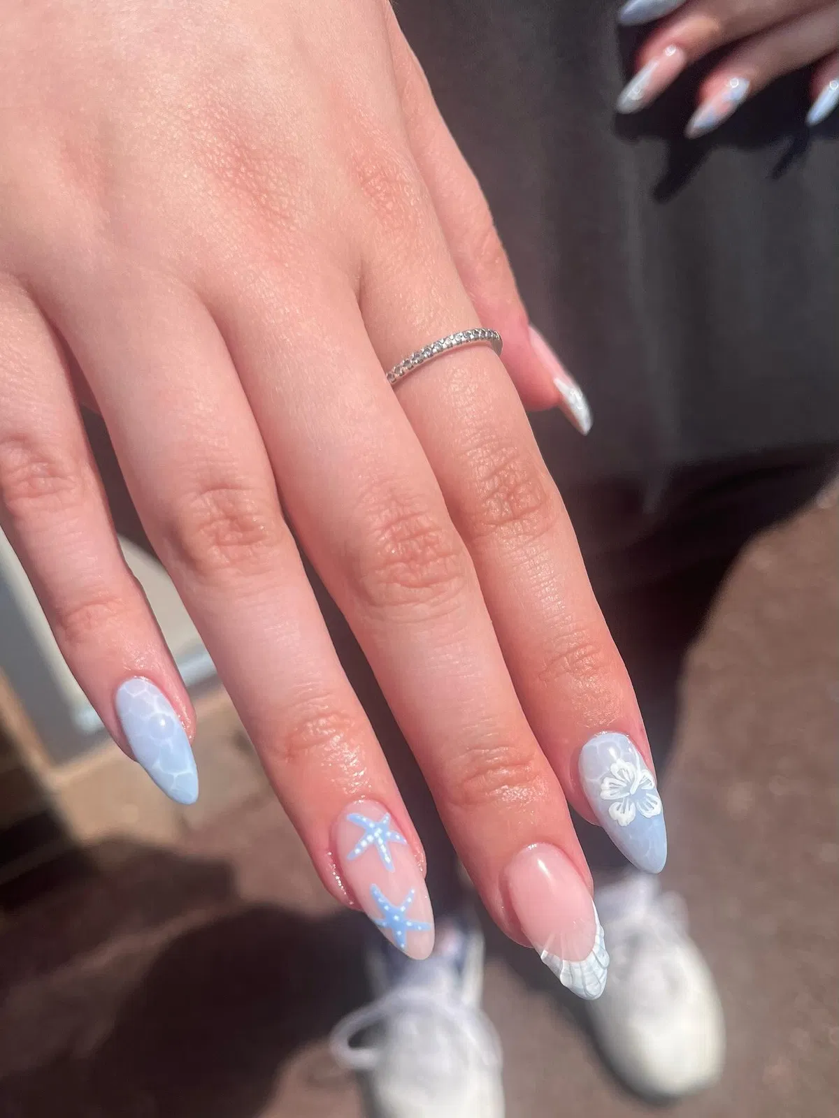 Pale blue mix with starfish and white flower accents
