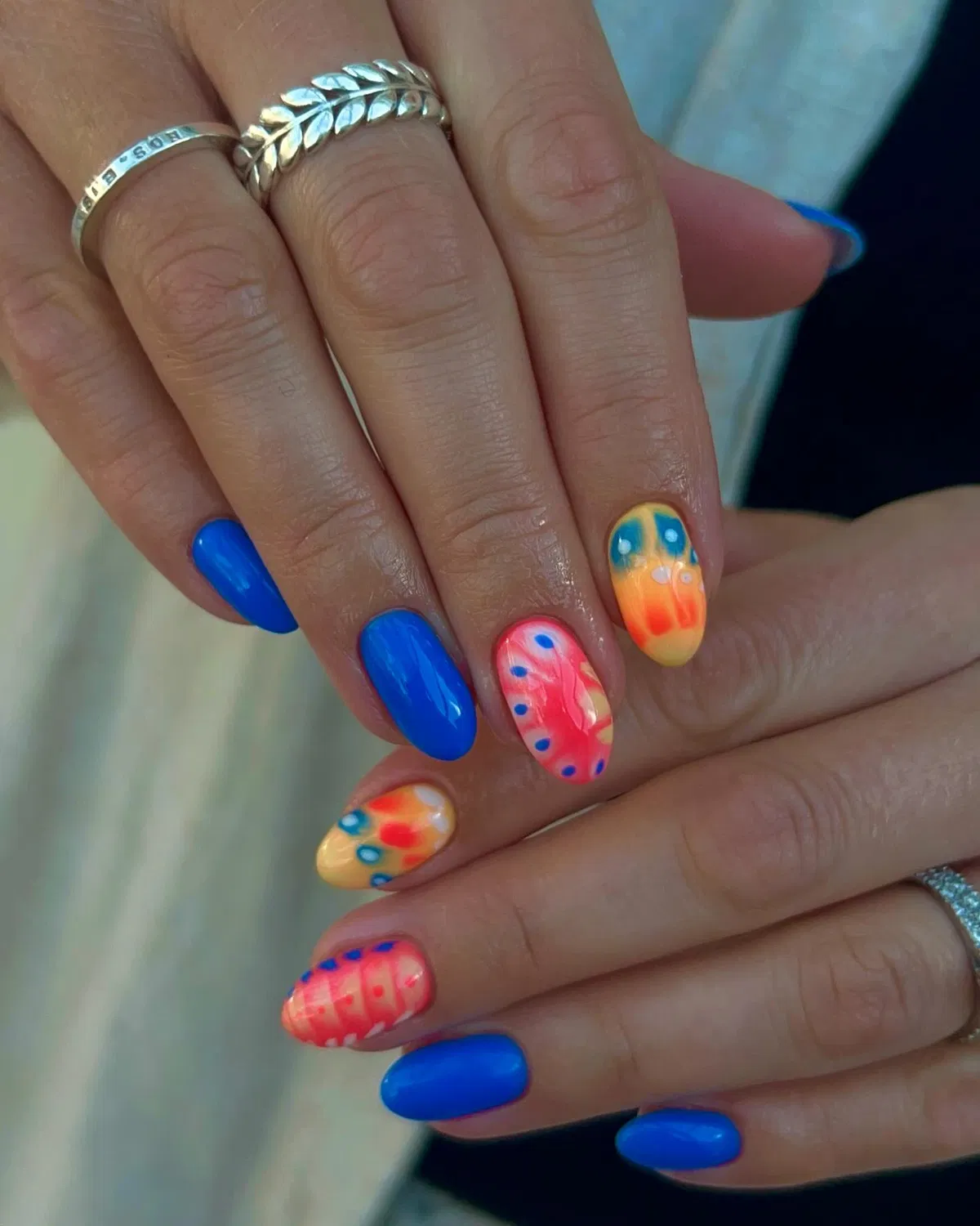 Bright blue solids with multicolor gradient dot accents
