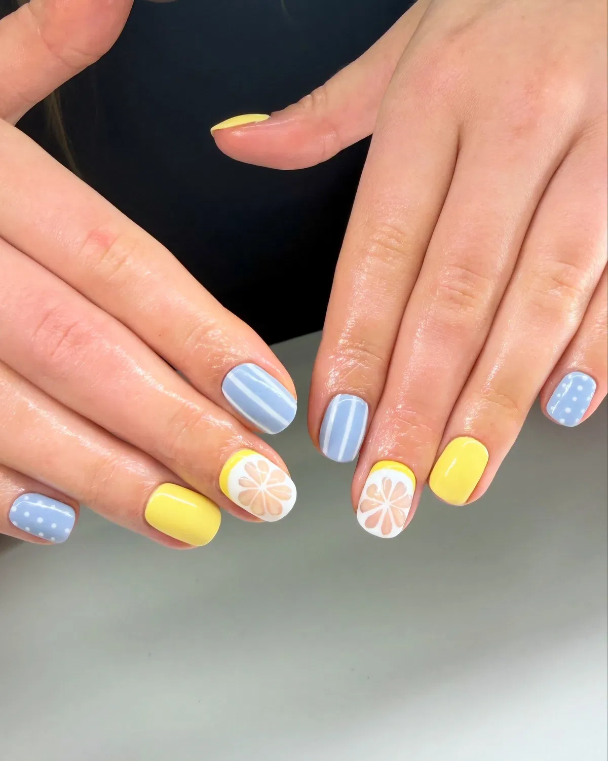 Color-block yellow and blue with peach-toned citrus slices