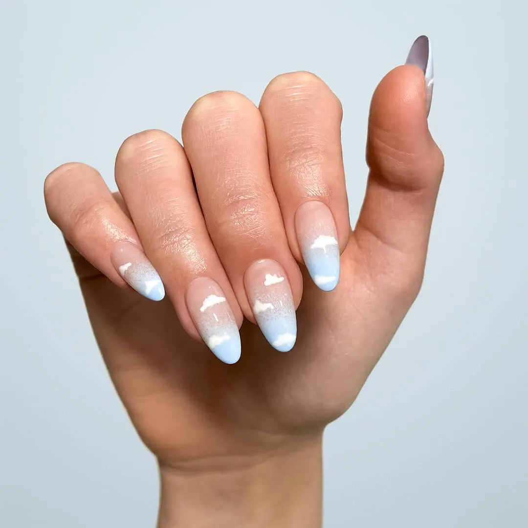 Pale blue gradient tips with white cloud-like shapes