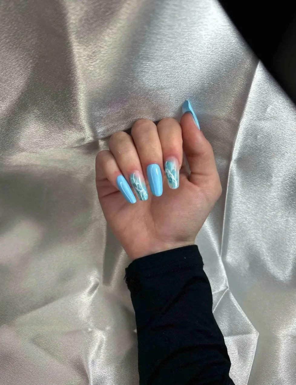 Light blue set with marbled accent nails