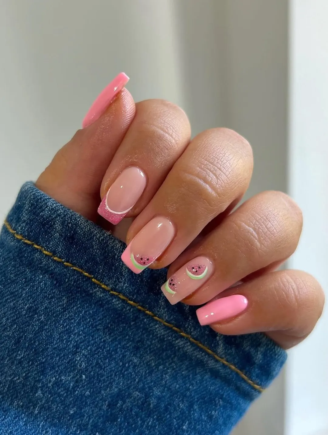 Mint glitter tips with simple flowers and a star accent
