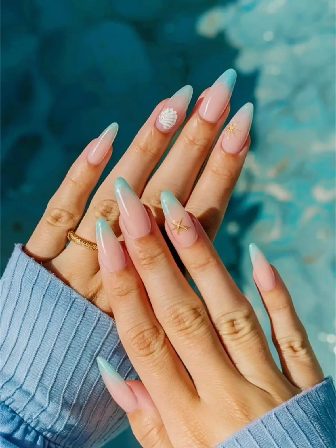 Pearly French tips with raised starfish and shell