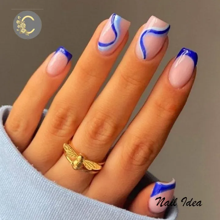 Blue square French tips with wavy line accents