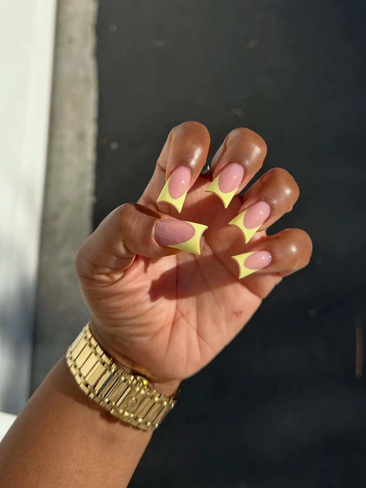 Pale yellow cutout French tips on long square nails