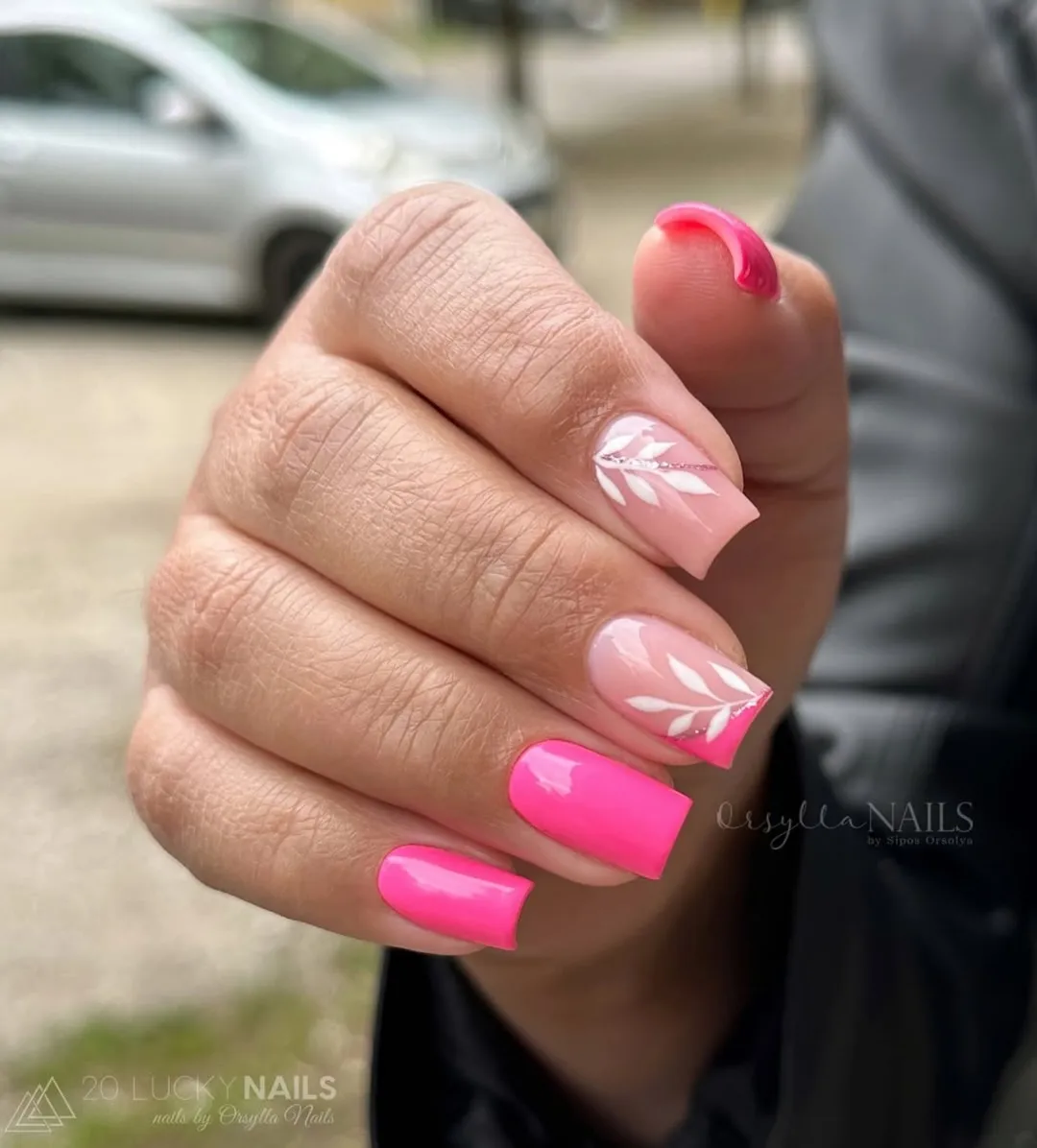Hot pink square nails with white leaf accents