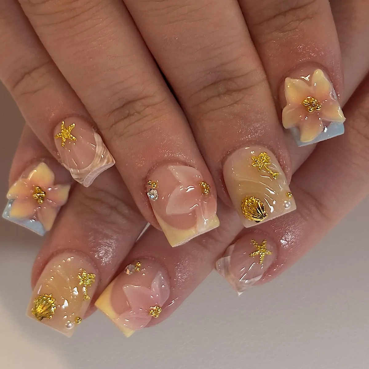3D florals with gold sea-themed accents