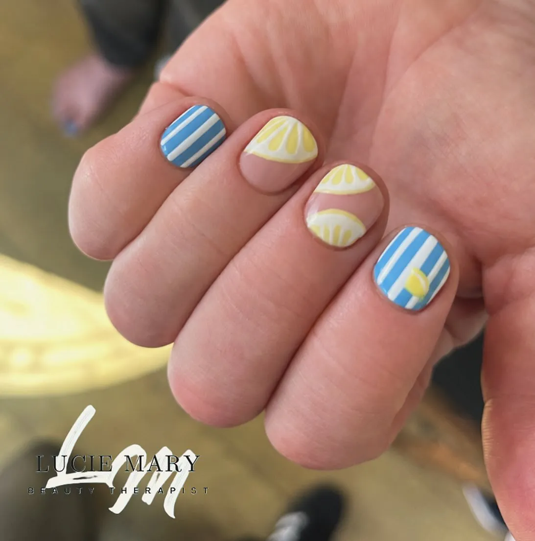 Blue stripes and yellow citrus-slice accents