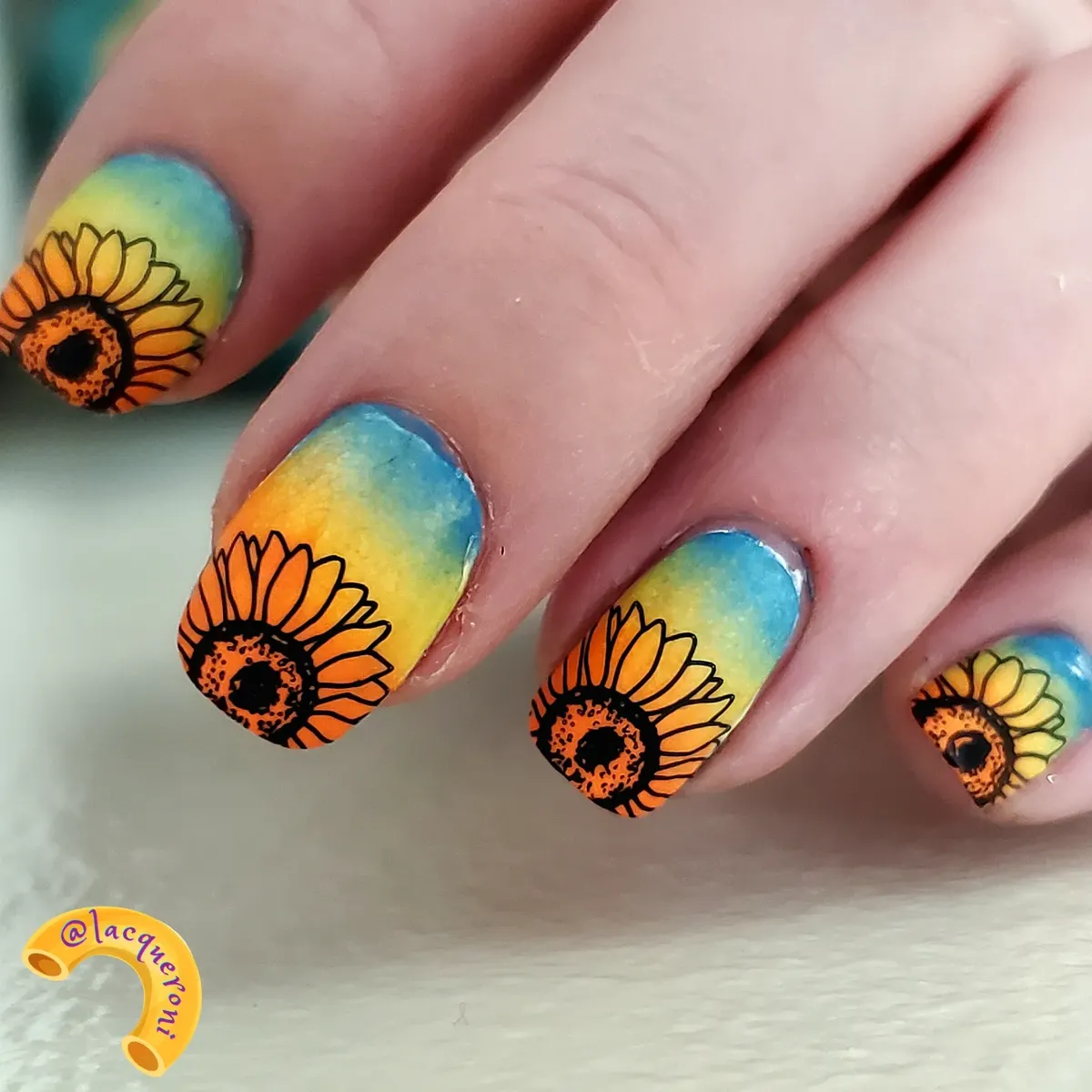 Blue-to-yellow gradient with black-outlined sunflower tips